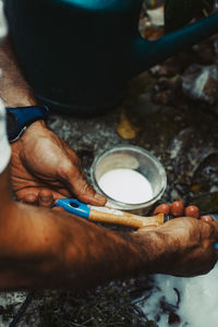 Close-up of man preparing food