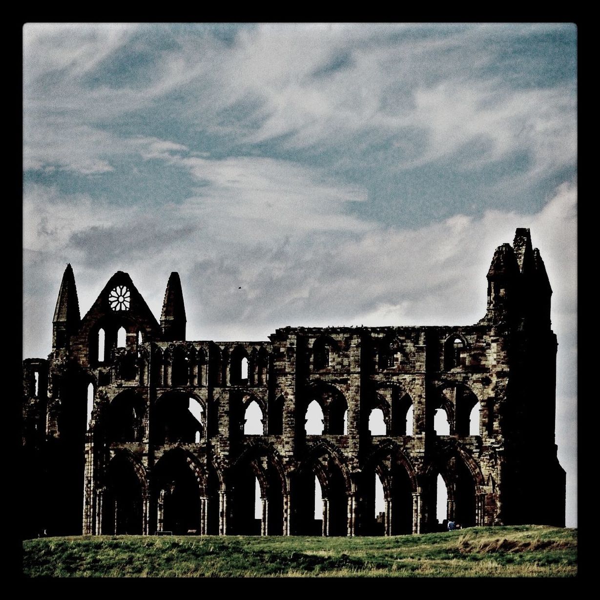 architecture, built structure, building exterior, sky, history, old, cloud - sky, the past, low angle view, transfer print, old ruin, auto post production filter, stone wall, cloud, arch, castle, abandoned, ancient, cloudy, religion