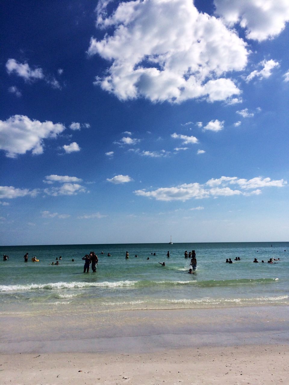 beach, sea, sand, sky, shore, water, horizon over water, vacations, large group of people, cloud - sky, leisure activity, scenics, lifestyles, tranquil scene, tranquility, beauty in nature, cloud, men, nature