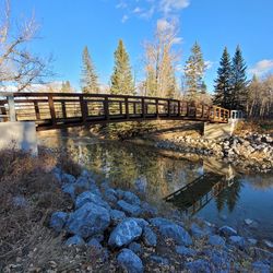 Bridge over river against sky