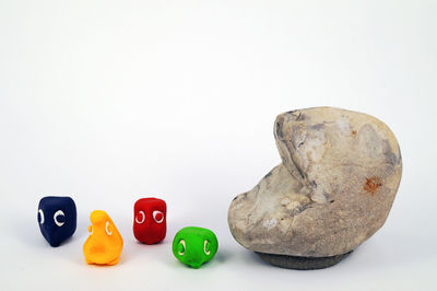 Close-up of multi colored pencils on white background