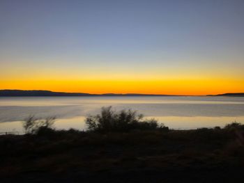 View of calm sea at sunset