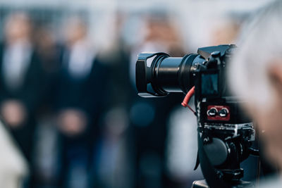 Public live event media coverage, television cameras at a press conference