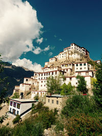 View of town against blue sky