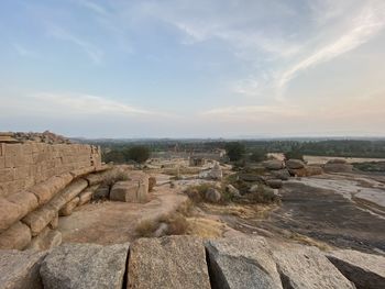 Scenic view of rock formations against sky