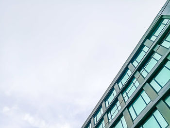 Low angle view of modern building against sky