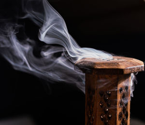 Close-up of smoke against black background