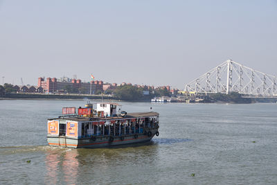 Ship in sea against clear sky