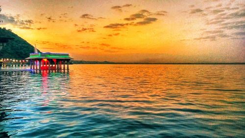 Scenic view of sea against sky during sunset