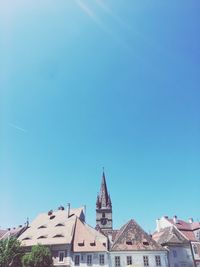 Low angle view of temple against clear blue sky