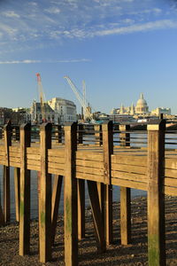 View of wooden bridge over river