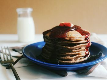 Close-up of pancakes with jam