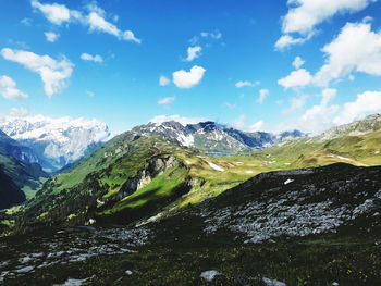 Scenic view of snowcapped mountains against sky