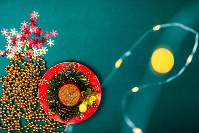 High angle view of red berries on table