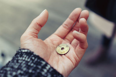 Close-up of person holding hands