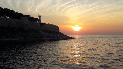 Scenic view of sea against sky during sunset