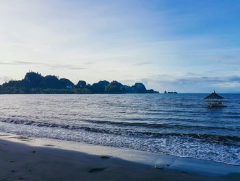 Scenic view of beach against sky