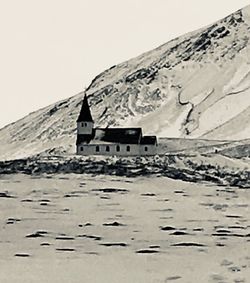 Built structure on snow covered landscape