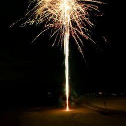 Firework display at night