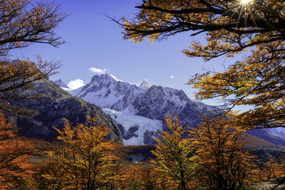 Scenic view of mountains against sky during winter