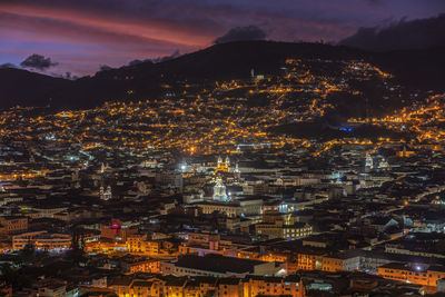 High angle view of illuminated cityscape at night