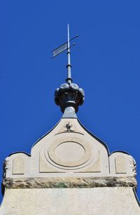 Low angle view of a building against blue sky