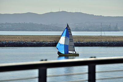 Boat in sea against sky