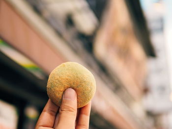 Close-up of hand holding food