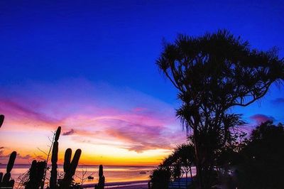 Scenic view of sea at sunset