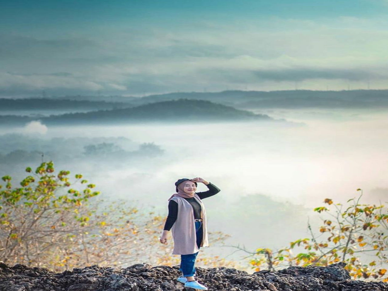 one person, sky, nature, horizon, morning, sunlight, environment, adult, landscape, beauty in nature, land, full length, standing, fog, mountain, cloud, scenics - nature, clothing, plant, tranquility, leisure activity, outdoors, copy space, women, young adult, activity, rural scene, solitude, contemplation, looking, casual clothing, day, vacation, travel, sea, holiday, tranquil scene, lifestyles, hiking, trip, forest, water, tree, autumn, idyllic, looking at view, relaxation, childhood, child