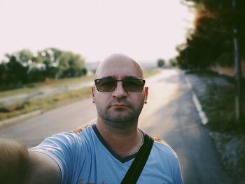 Portrait of young man wearing sunglasses