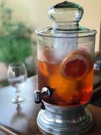 Close-up of beer in glass jar on table