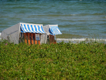 Hooded chairs on beach