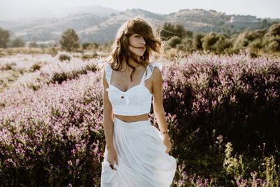 Portrait of woman on field