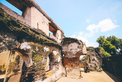 Low angle view of old building against sky