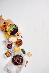 High angle view of fruits against white background