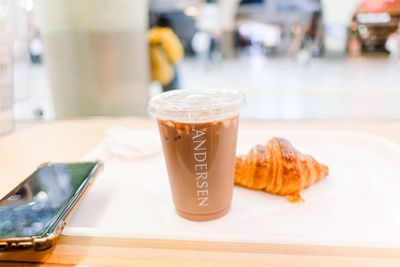 Close-up of coffee served on table