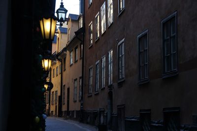 Illuminated lamps in alley