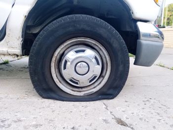 Close-up of vintage car on street