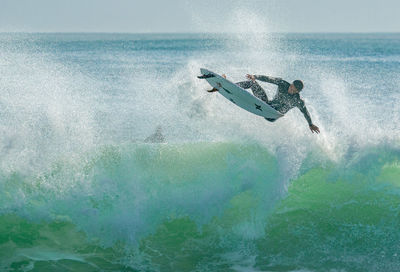 Man surfing in sea