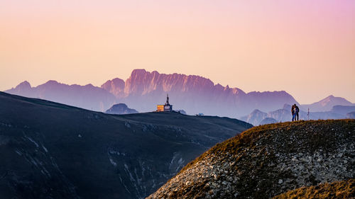 Scenic view of mountains against sky during sunset