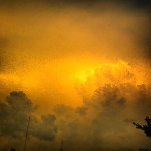 sunset, sky, low angle view, orange color, cloud - sky, silhouette, beauty in nature, nature, tranquility, scenics, dramatic sky, cloudy, dusk, outdoors, tranquil scene, no people, tree, yellow, cloud, idyllic