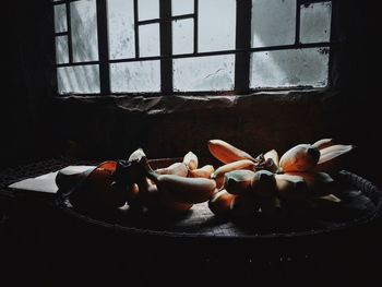 Close-up of fruits on window sill