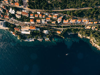 High angle view of river amidst buildings in city