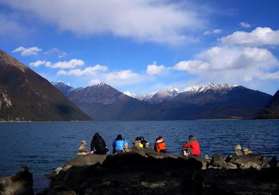 Scenic view of lake with mountains in background