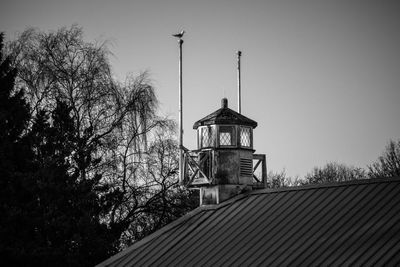 Low angle view of water tower against sky