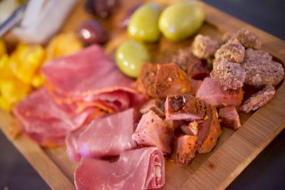 High angle view of meat on cutting board