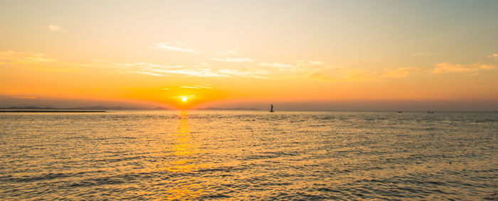 Scenic view of sea against sky during sunset