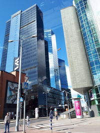 People walking on modern office building