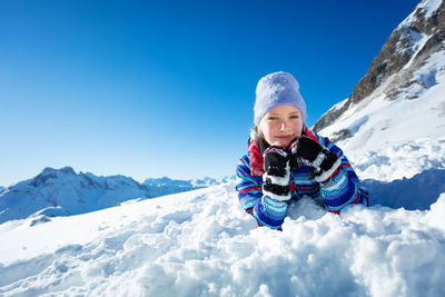 Man skiing on snow covered mountain